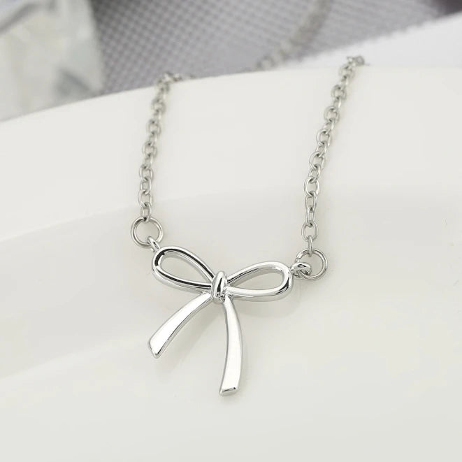 Gold-Tone Bow Pendant Necklace