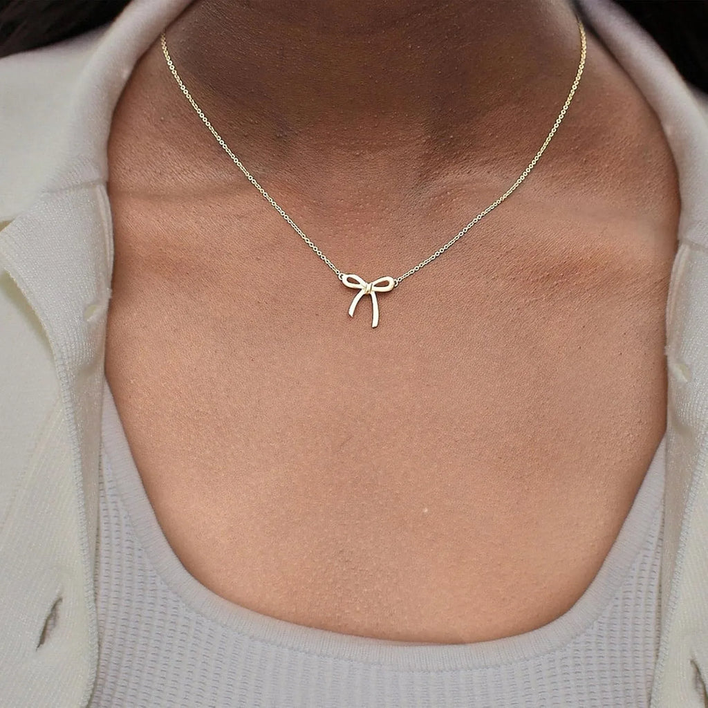 Gold-Tone Bow Pendant Necklace